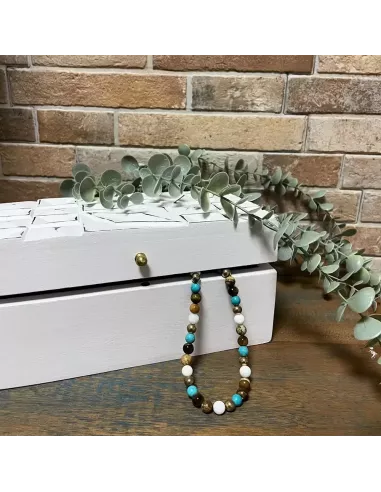 Caja de madera vintage blanca usada como joyero
